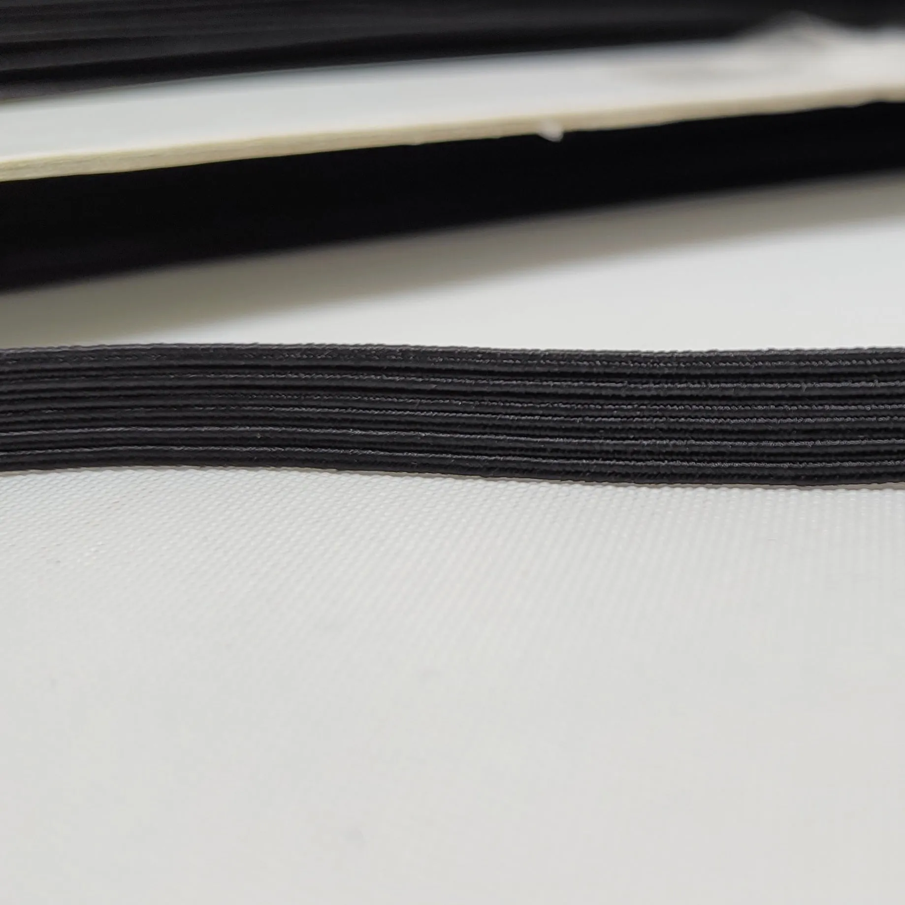 FLE09 - 9mm 12 Cord Flat Elastic