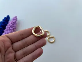 Golden Metallic D Rings